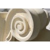 Hand carved Ionic capitals