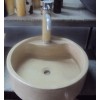 Beiger travertine sinks