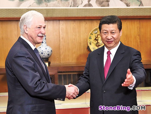 Xi vows to continue improving Russia ties