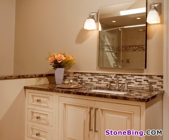 Glass and stone mosaic used as the vanity backsplashes