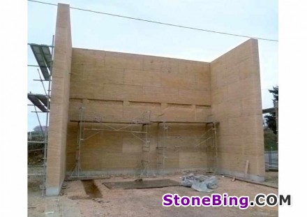 Construction with small natural stone blocks