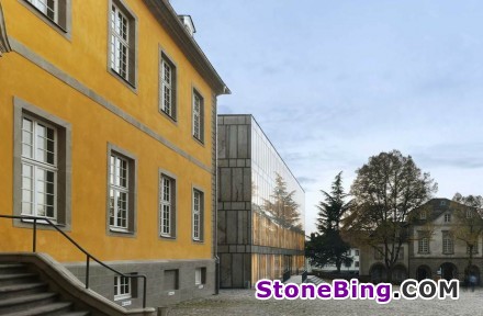 Glass panes with stone facsimiles form the façade of Essen’s Folkwang-Library in Germany