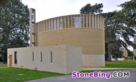 The façade of England‘s Ripon College Chapel is clad in a natural stone weave