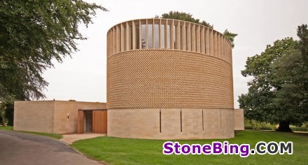 The façade of England‘s Ripon College Chapel is clad in a natural stone weave